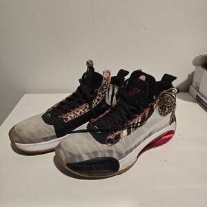 Jordan Leopard Print Athletic Shoes with Red Accents